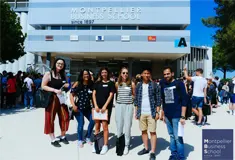 Students pose outside Montpellier Business School